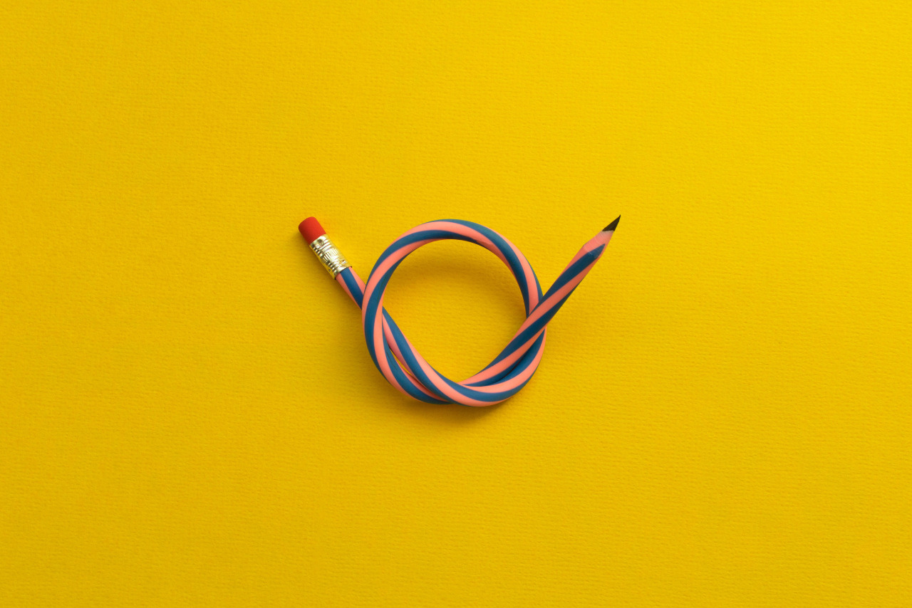 A bendable pencil twisted into a knot.
