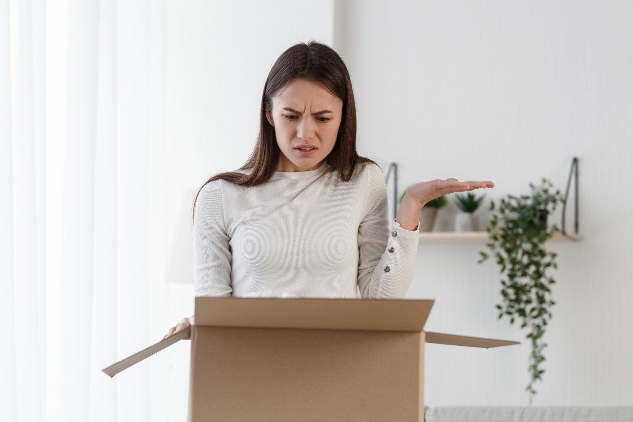 Disappointed female customer receiving the wrong order.