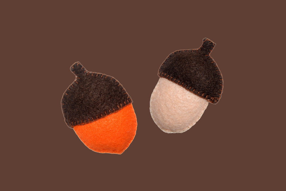 Two Felt Acorns.