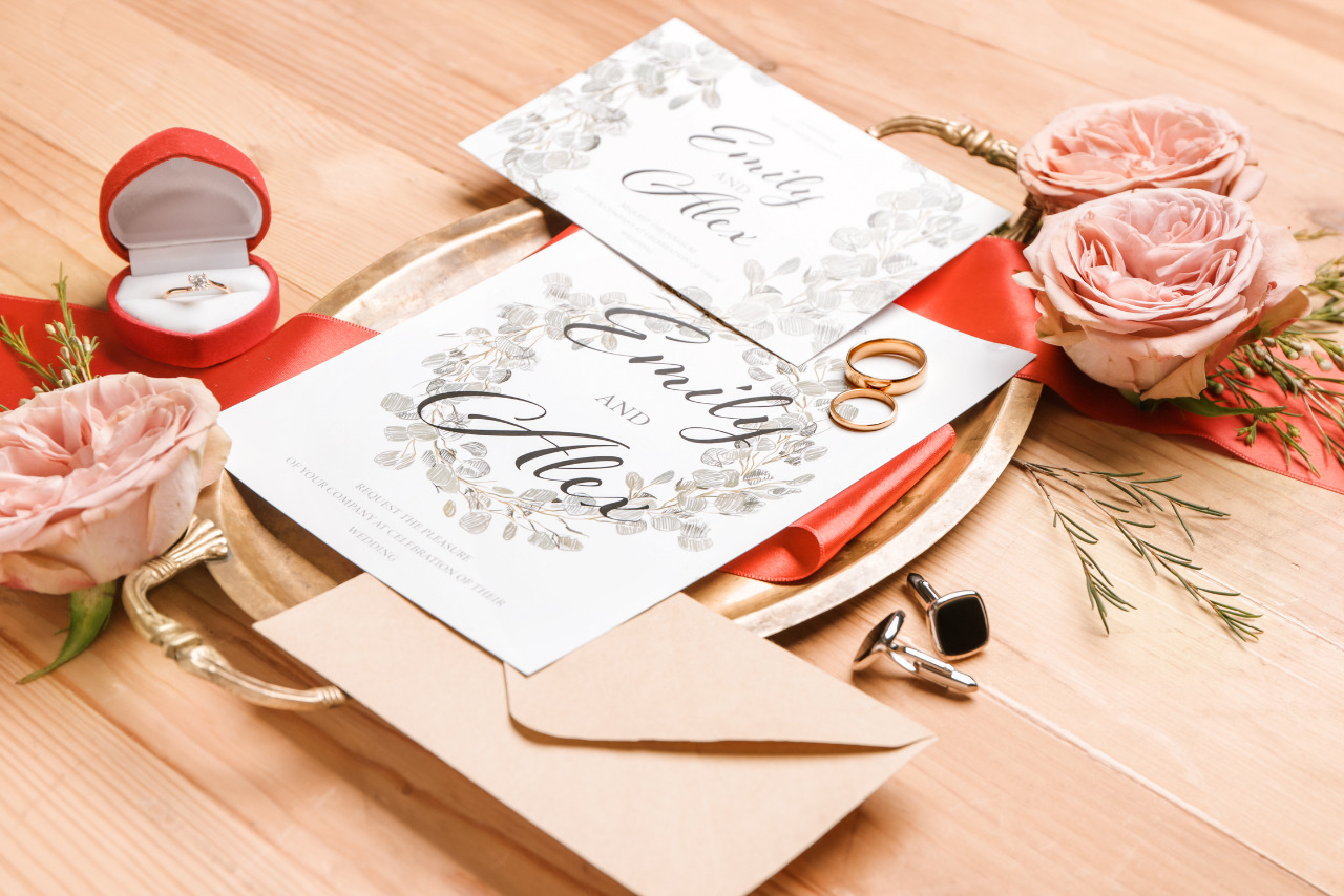 A stunning wedding invitation featuring a tangerine motif.