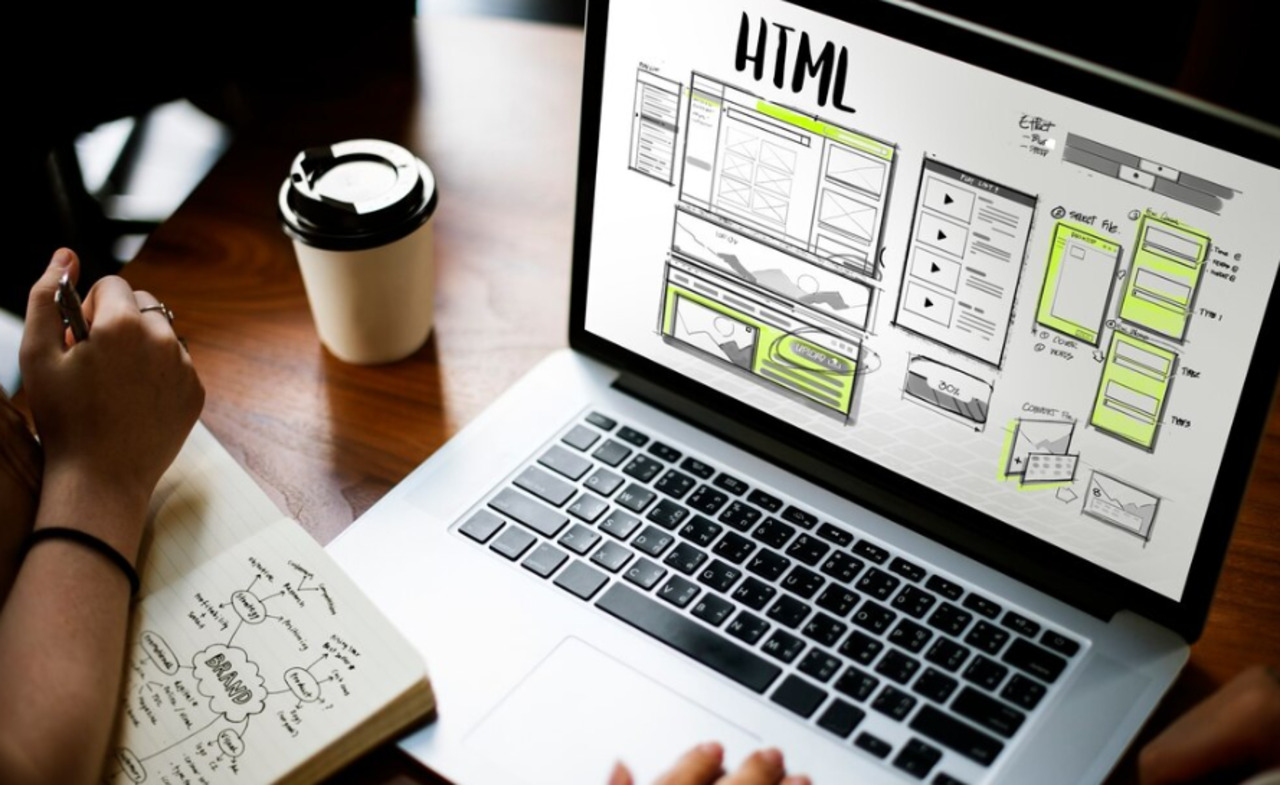 A website mockup displayed on a laptop.