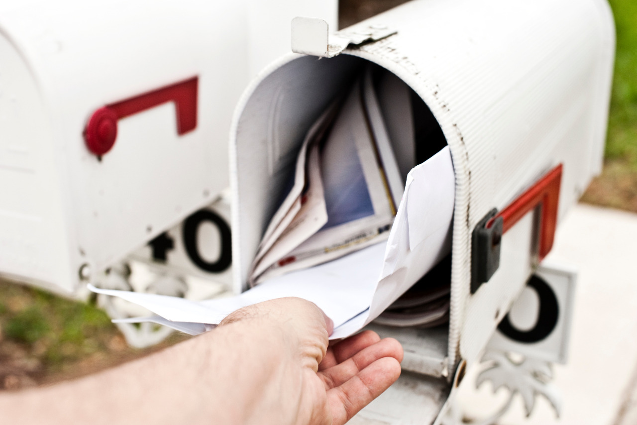 Hand getting the mail.