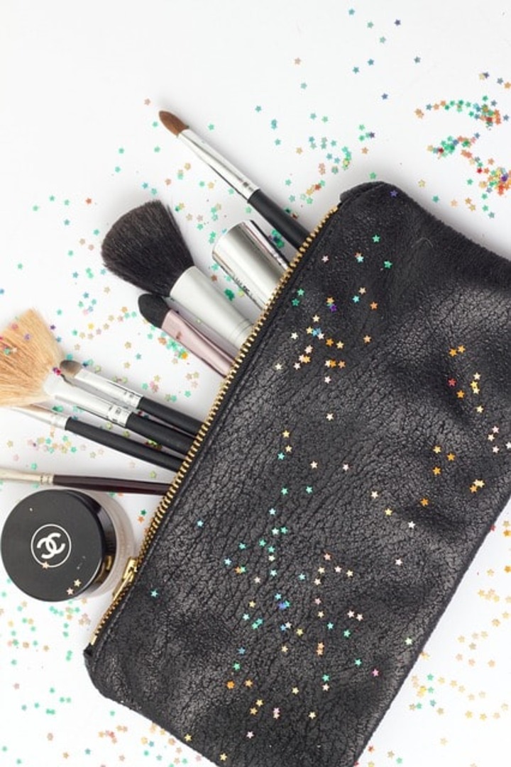 A purse with makeup tools.
