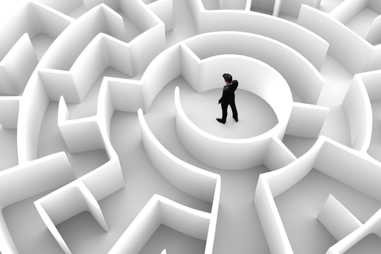 Just as a businessman navigates a maze to find the best path, software resolves challenges.