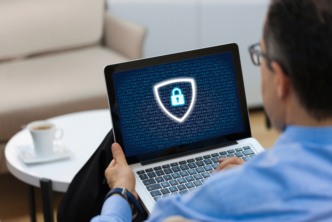 Male Data Protection Officer (DPO) protecting data.