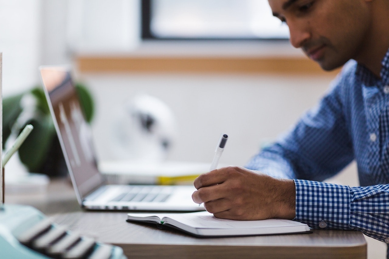 A man doing documentation.