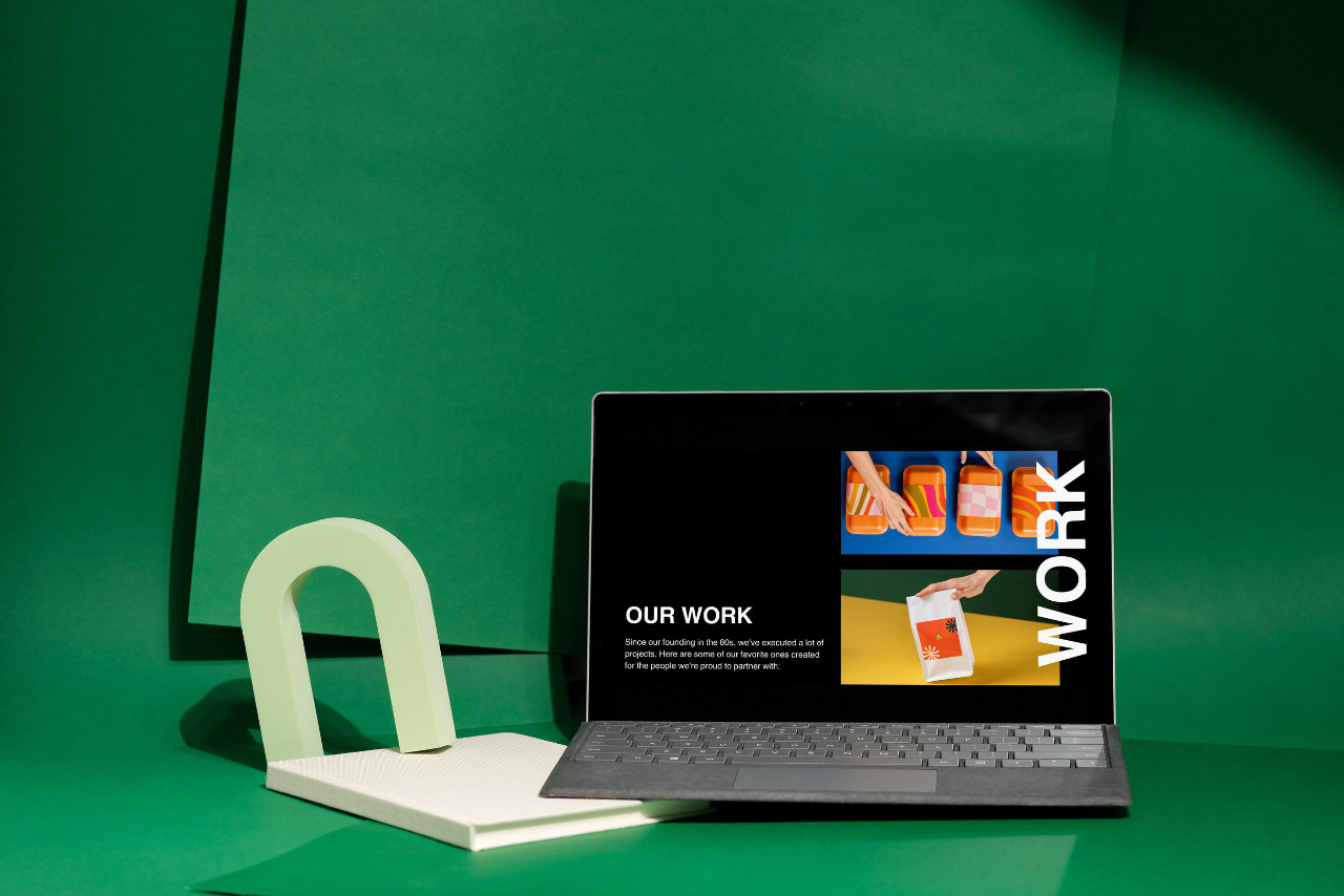 Portfolio or Work page Mockup on Laptop on Green Background.