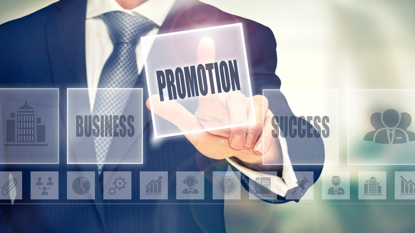 Businessman pressing a promotion concept button.