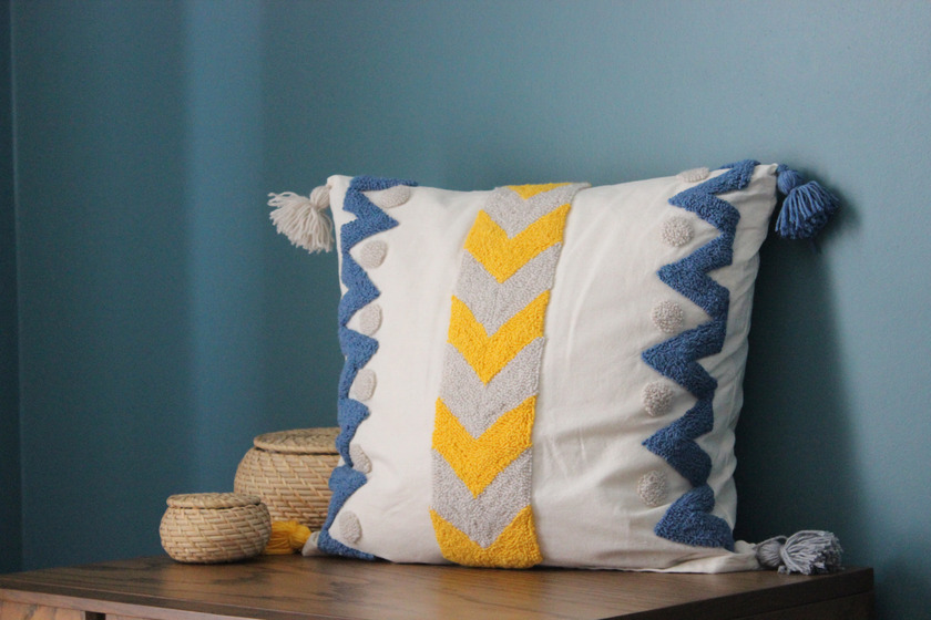 Close-Up Shot of a decorative Throw Pillow.