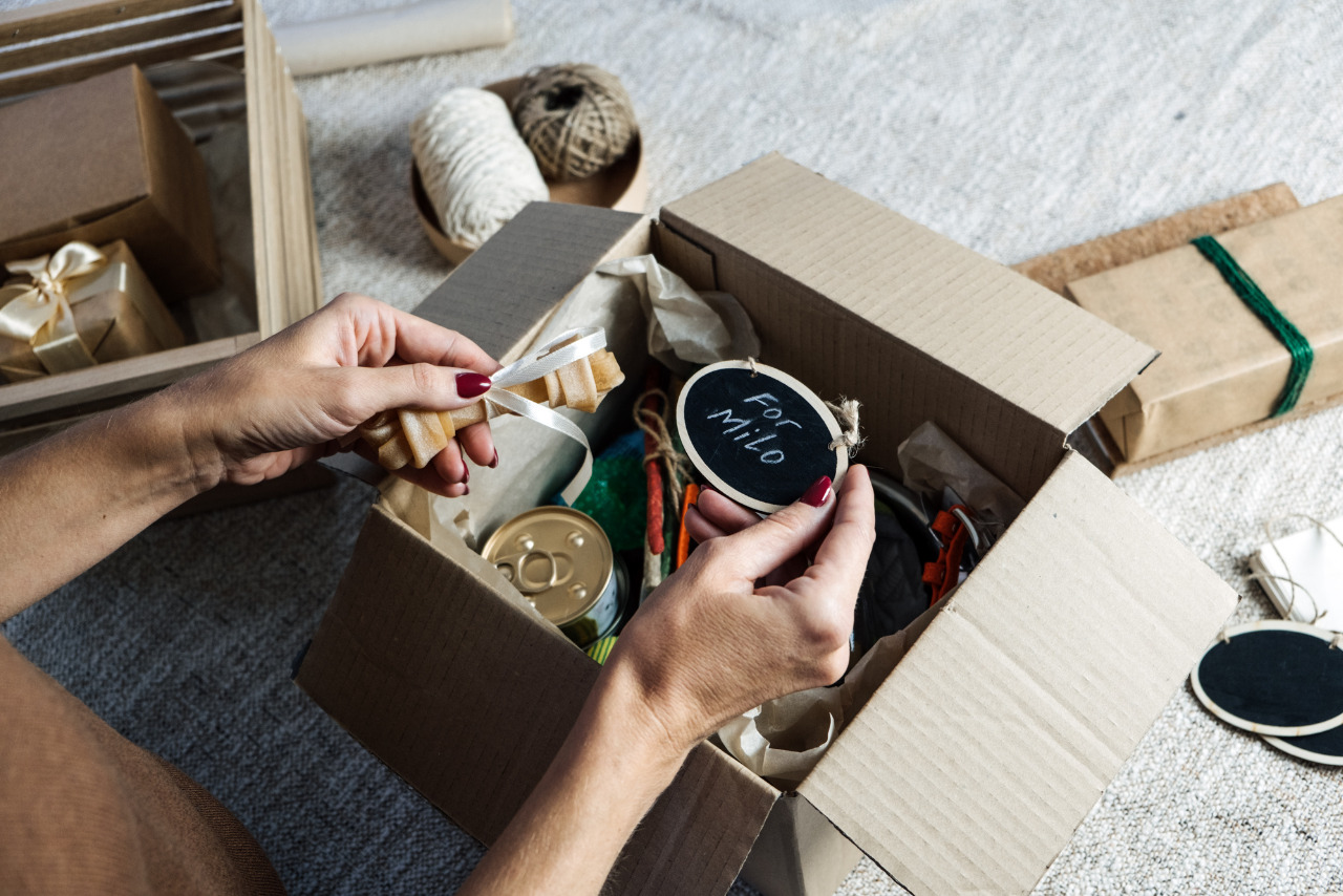 Lady opens personalized subscription box for pet.
