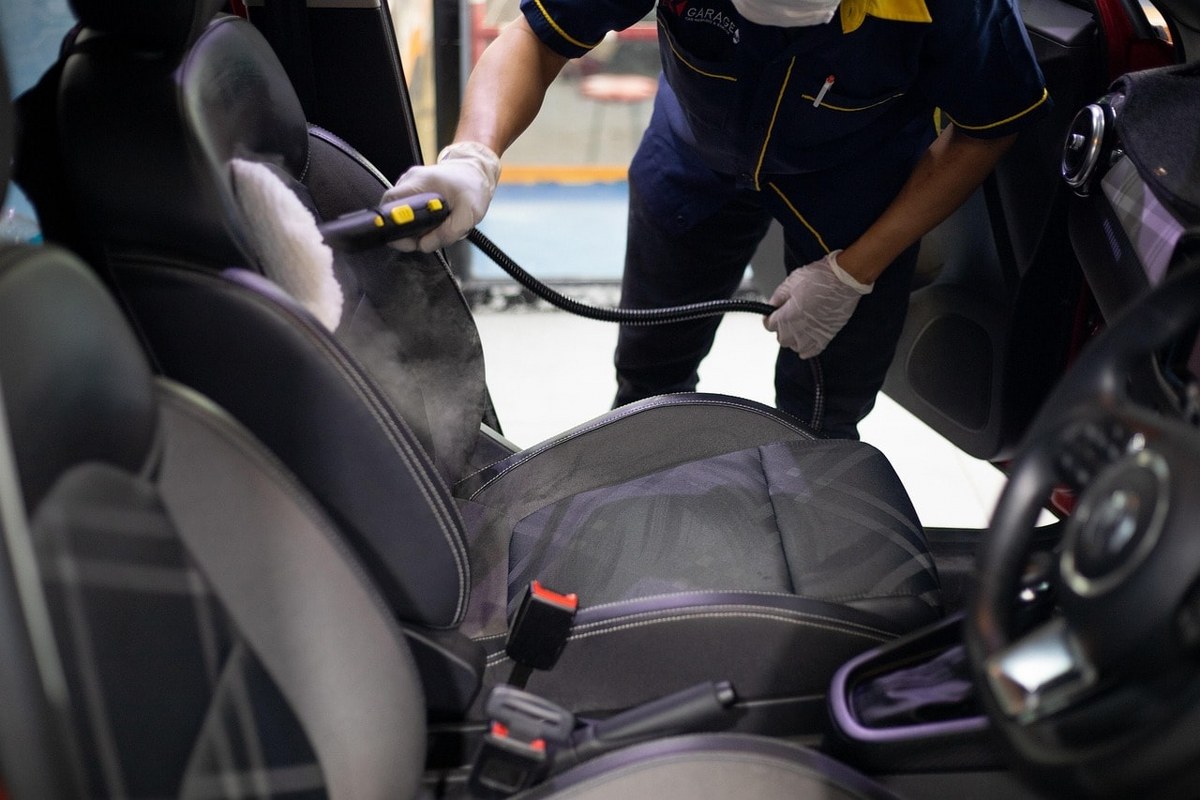 A car's interior being washed.