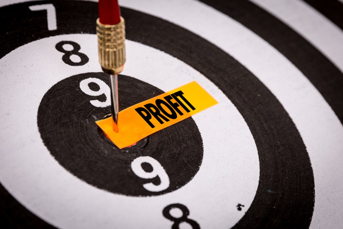 A dart hits an orange paper labeled 