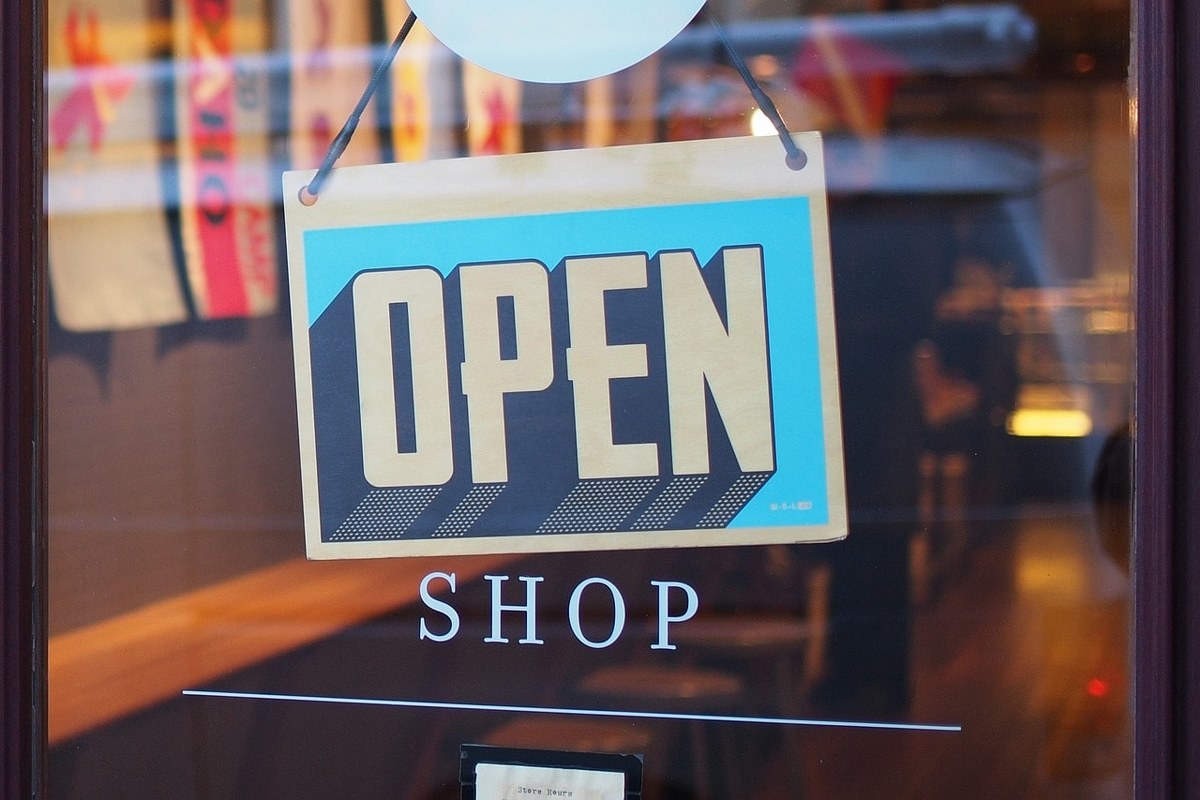 A local shop with an open sign.