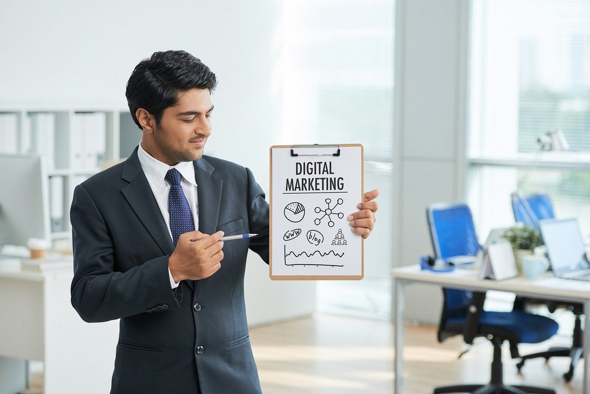 A man showing a clipboard with digital marketing illustration.