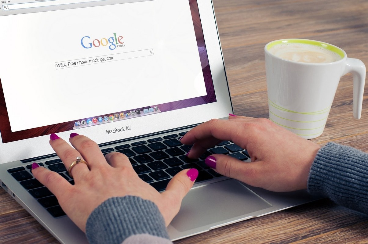 A woman researching on the web.