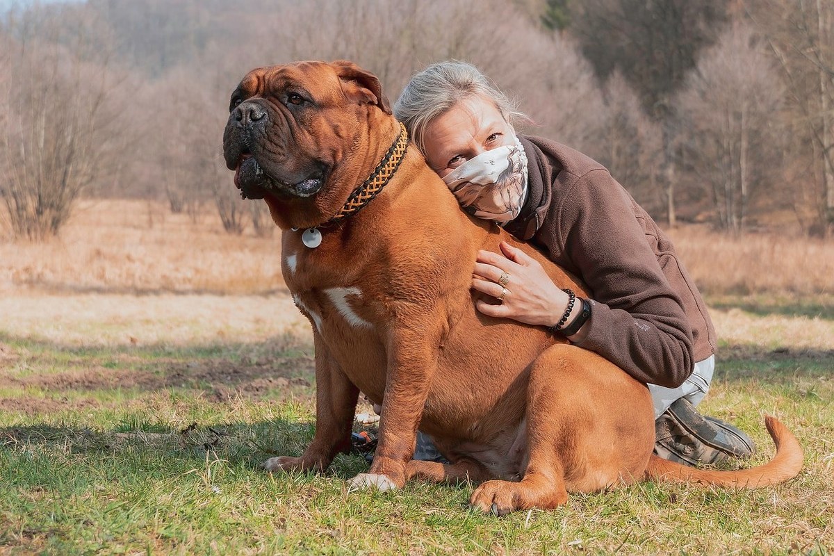 A woman with her dog.