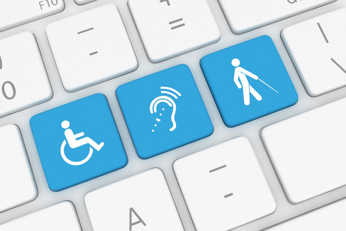 Accessibility icons on computer keyboard.