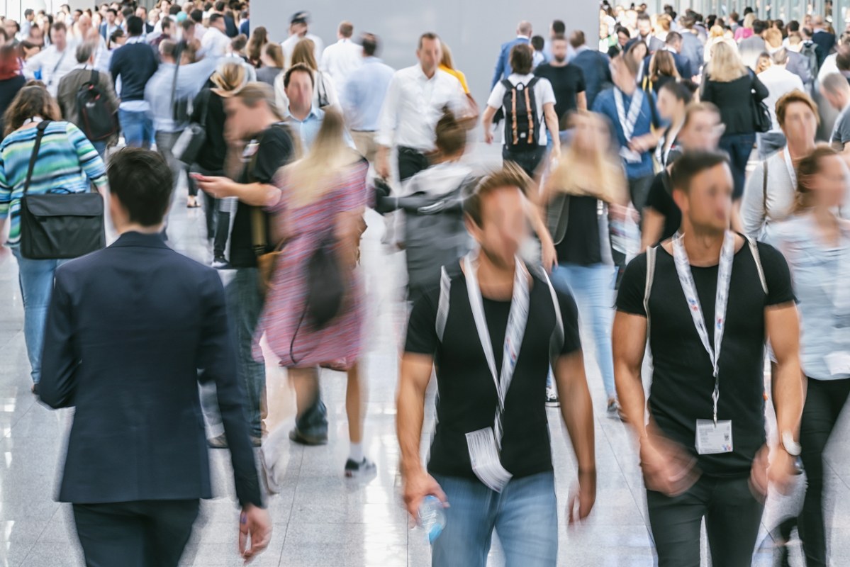 Blurred Business People at a trade event.