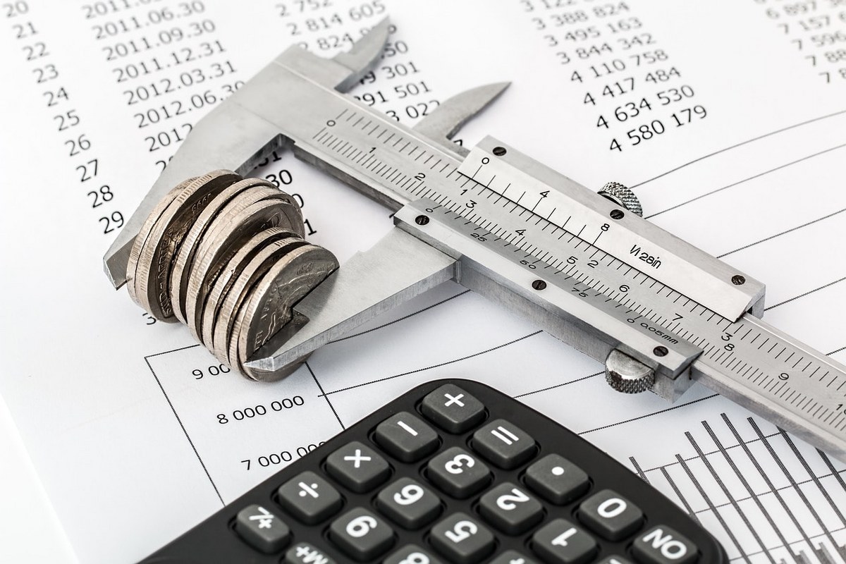 Coins attached to a measuring object.