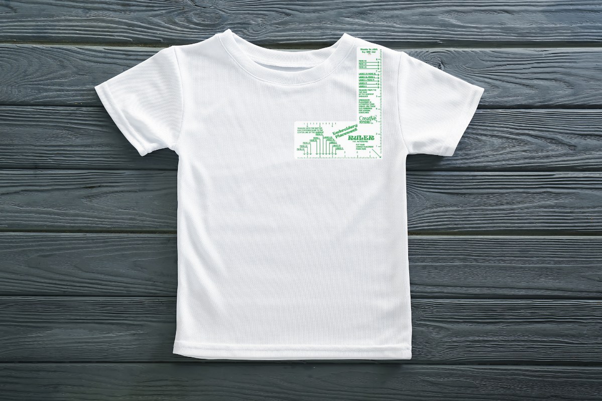 Embroidery Placement ruler on top of tshirt.