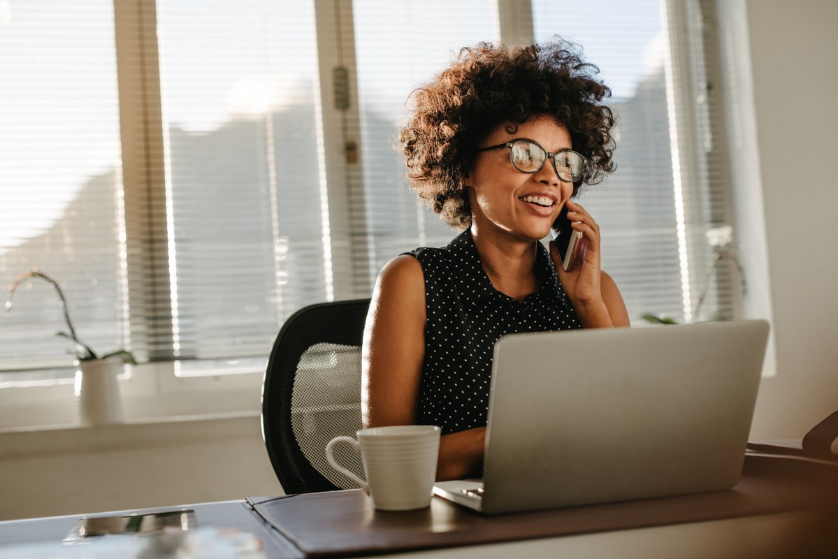 Female entrepreneur calling on phone.
