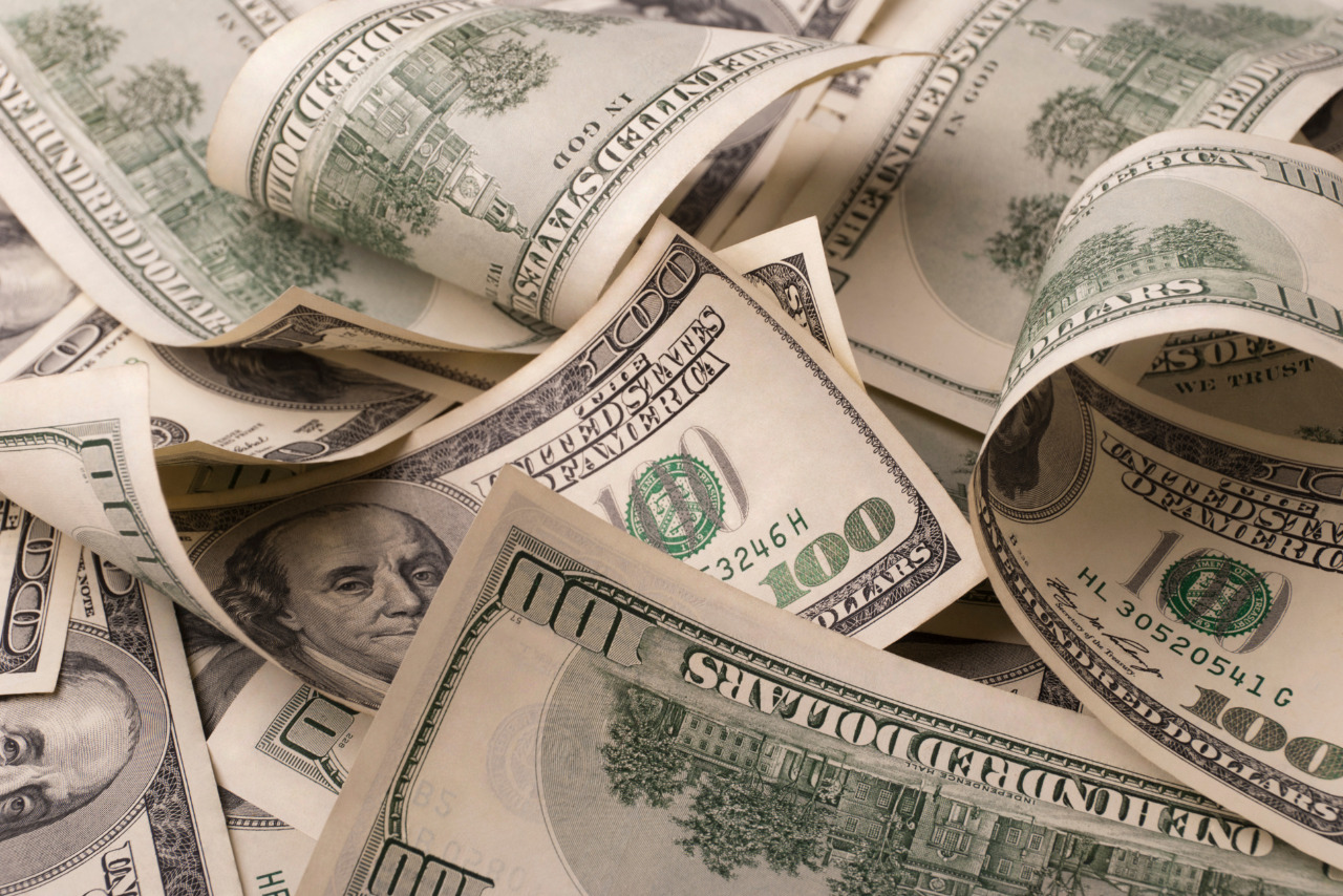 Hundred bills scattered about.