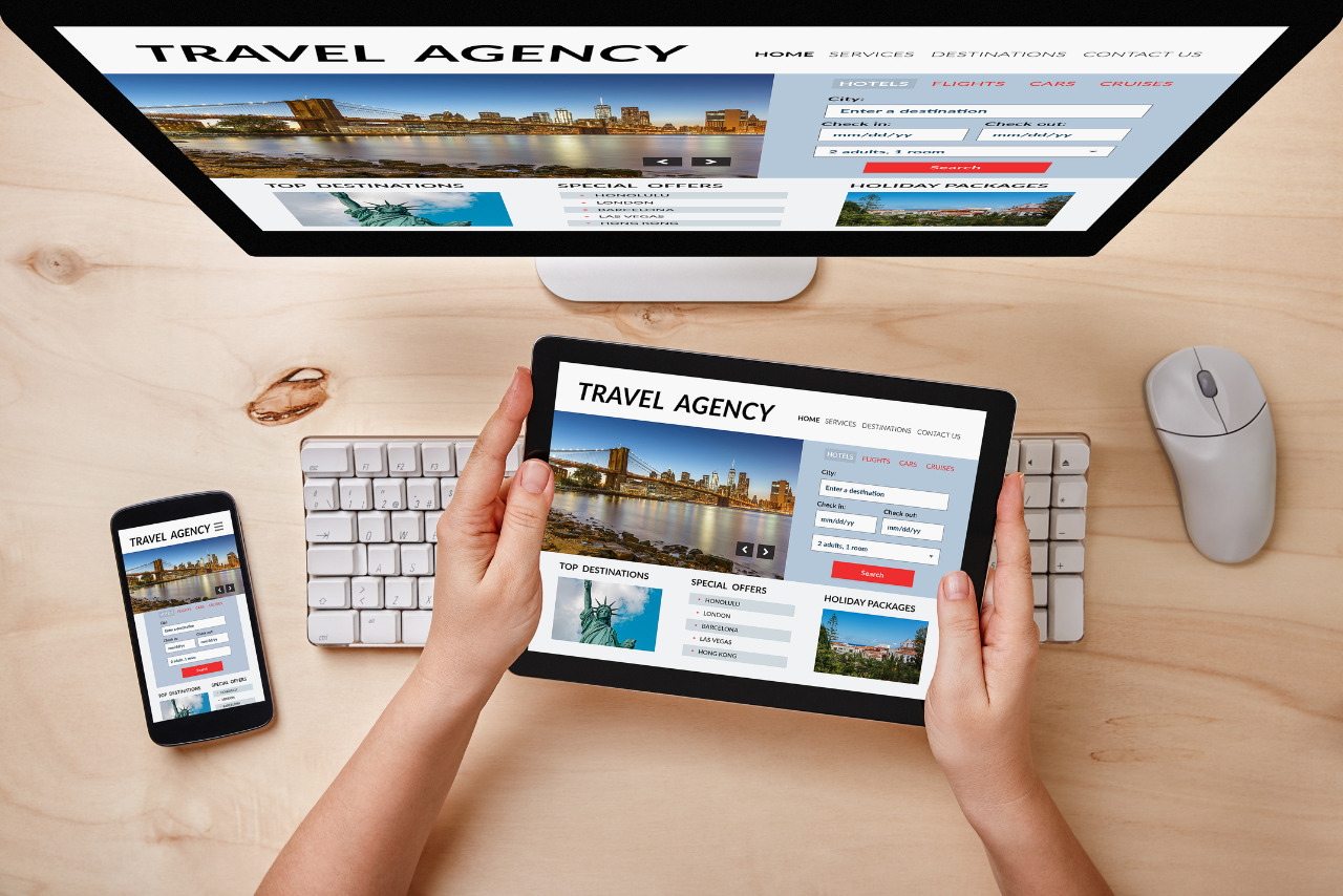 Online travel agency website on tablet screen.