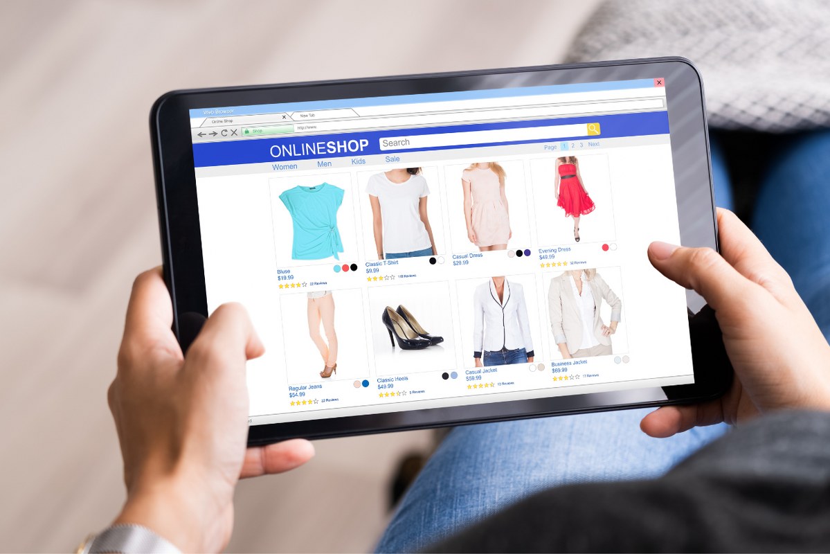 Person shopping on an online clothing store.