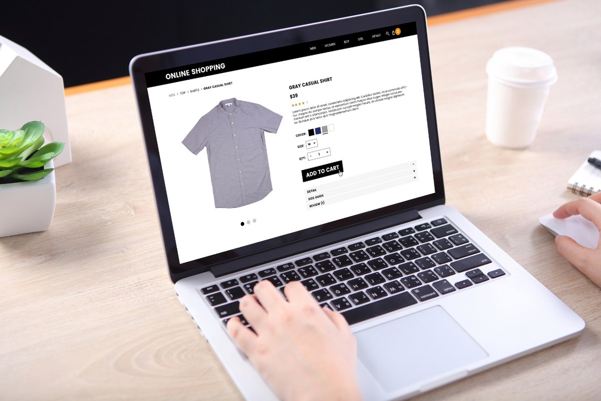 Person visiting Shopping Online using laptop.
