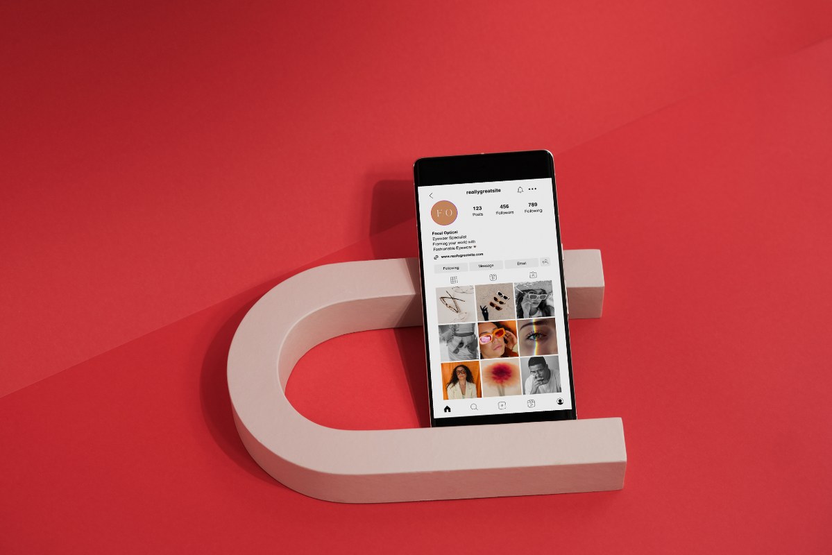Social Media Mockup on Smartphone on Red Background.