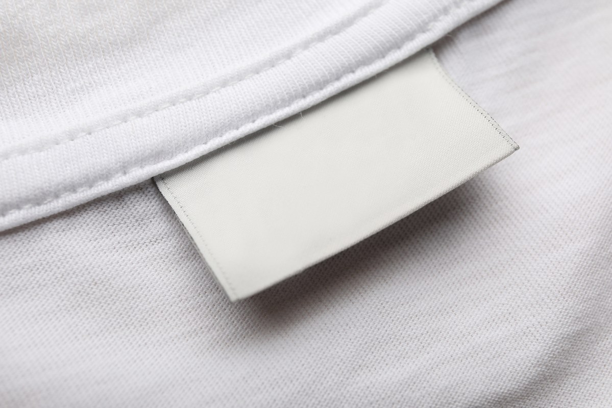 Super closeup view of white Label on Cloth.