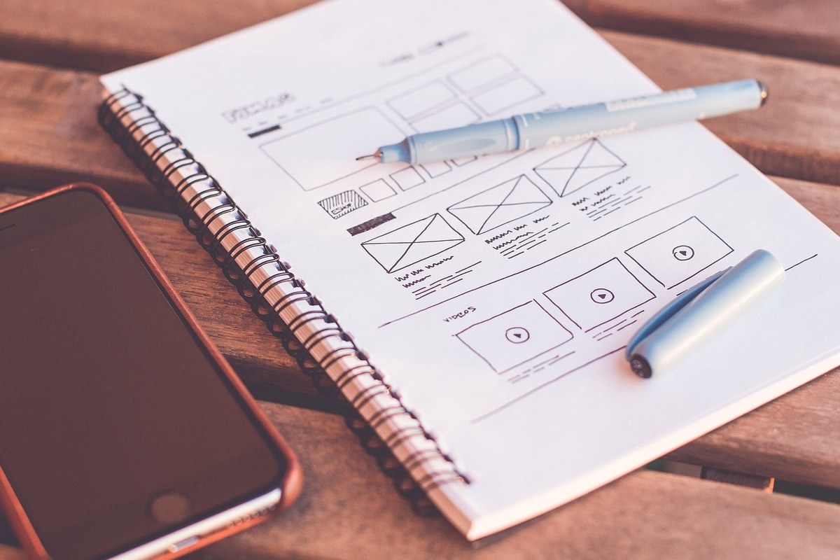 Web designing on a notebook.