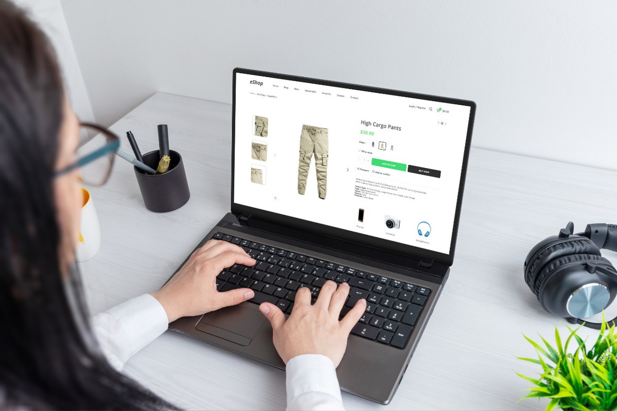 Woman browses cargo pants on an ecommerce website.