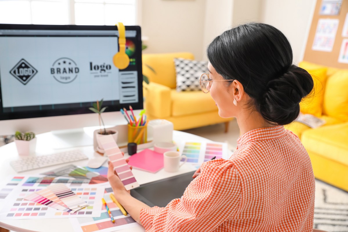 Woman creating logo and branding.
