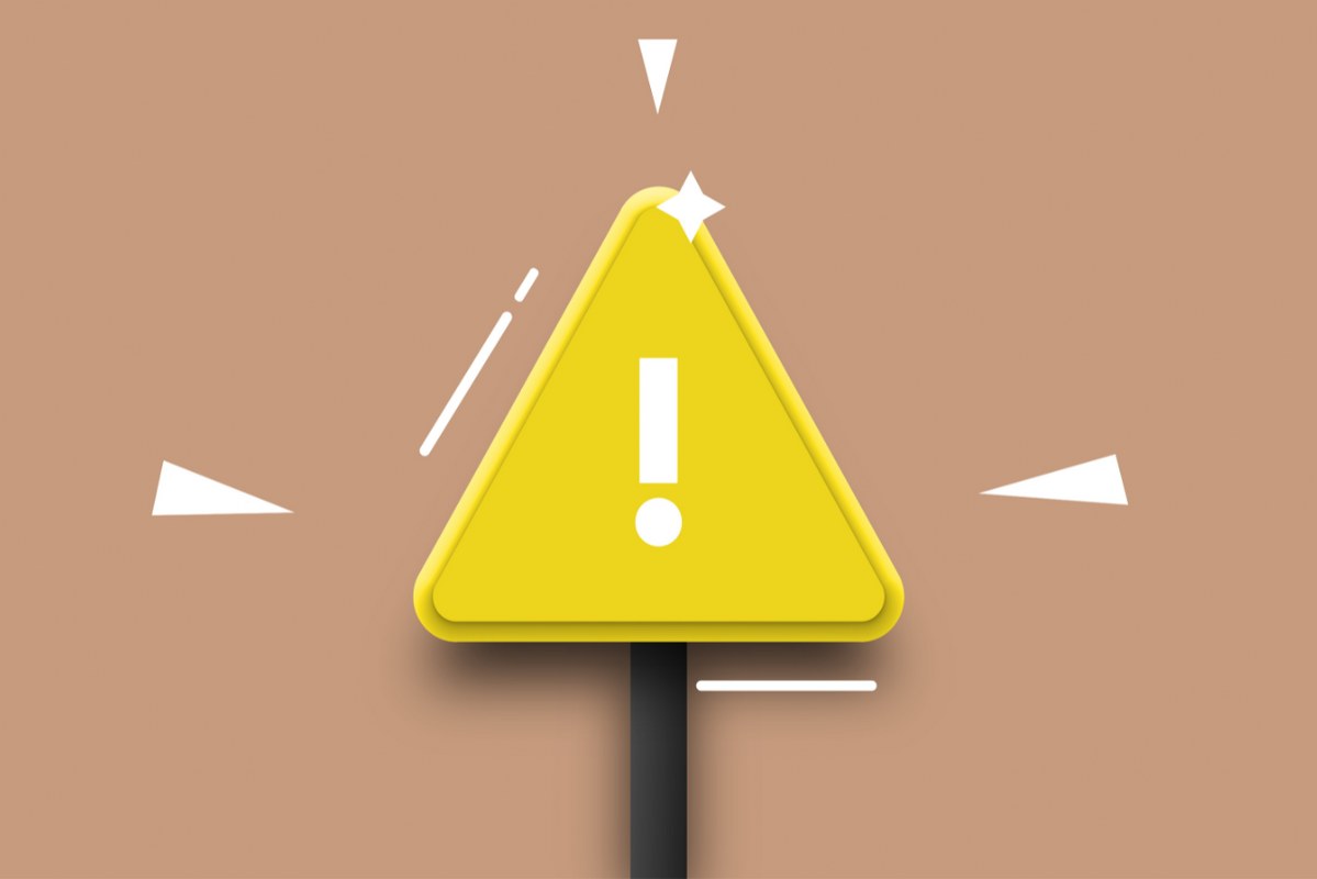 Yellow signboard with exclamation mark conveying price alert.