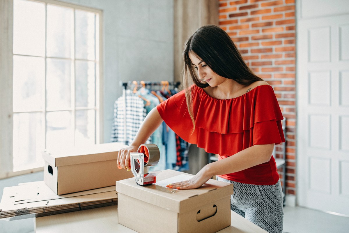 Young woman fulfilling online order.