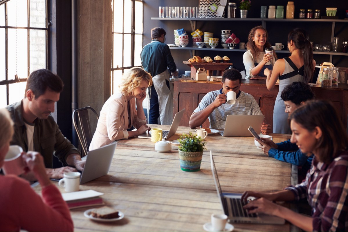 A bustling coffee shop filled with customers.