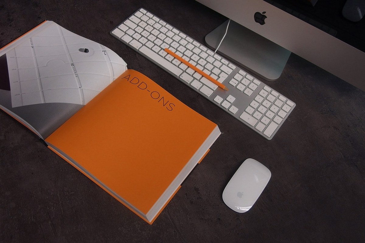 A computer and a notebook.