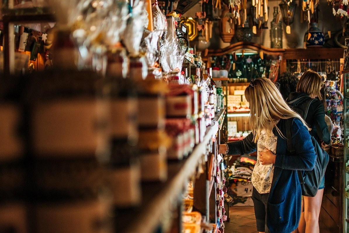 A customer inspecting an item in a local shop.