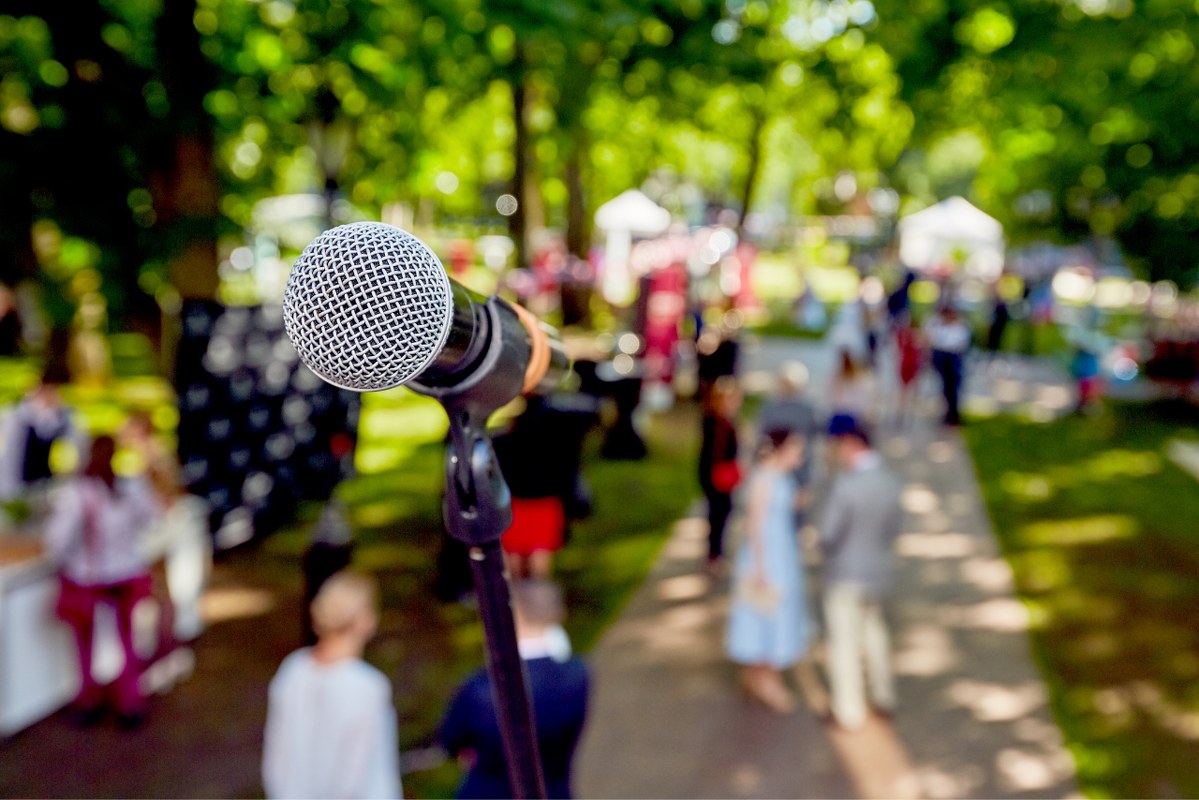 A microphone set up for hosting a lively outdoor gathering.