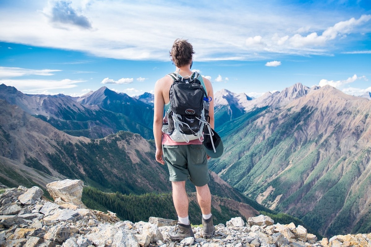 A traveller on top of a hill.