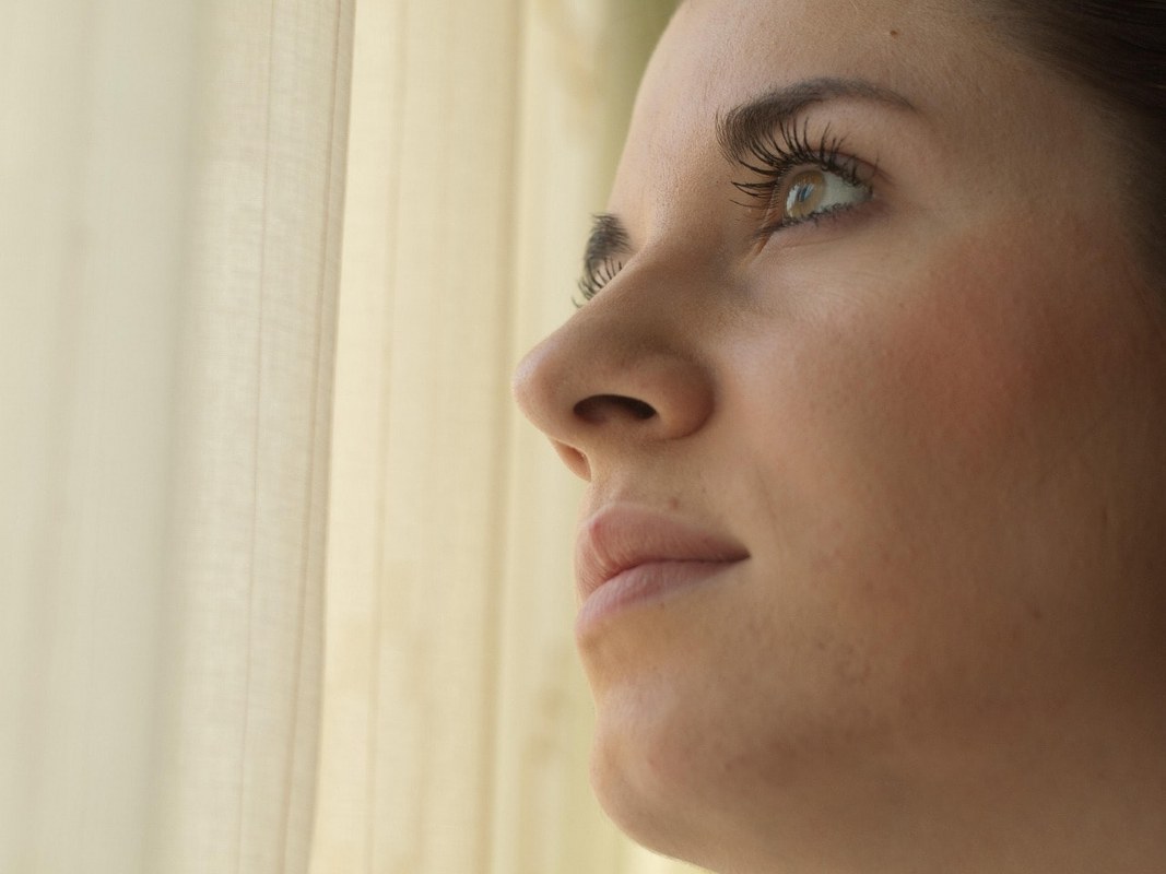 A woman deep in her thoughts.