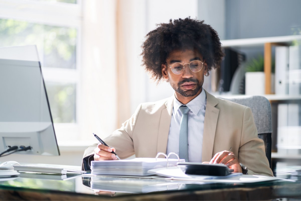 African American Accountant Manager Doing Accounting.