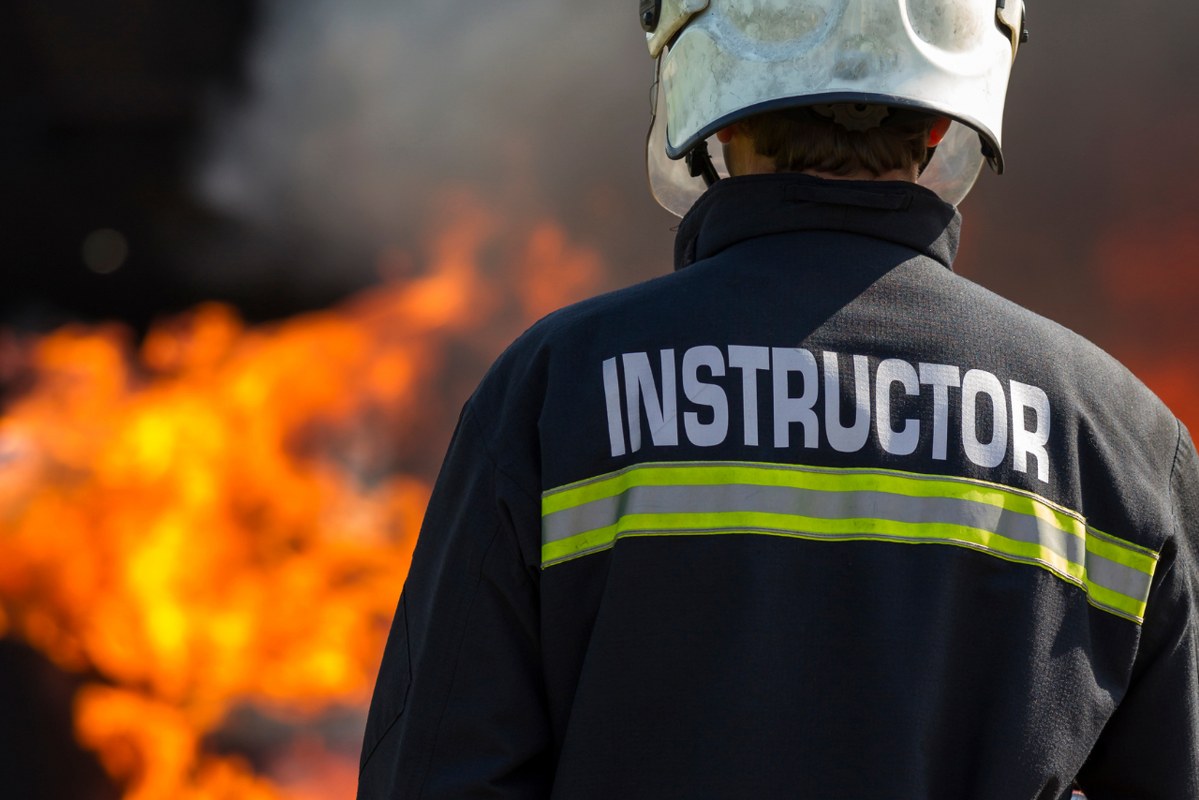 Backview of a Firefighter Training Instructor.