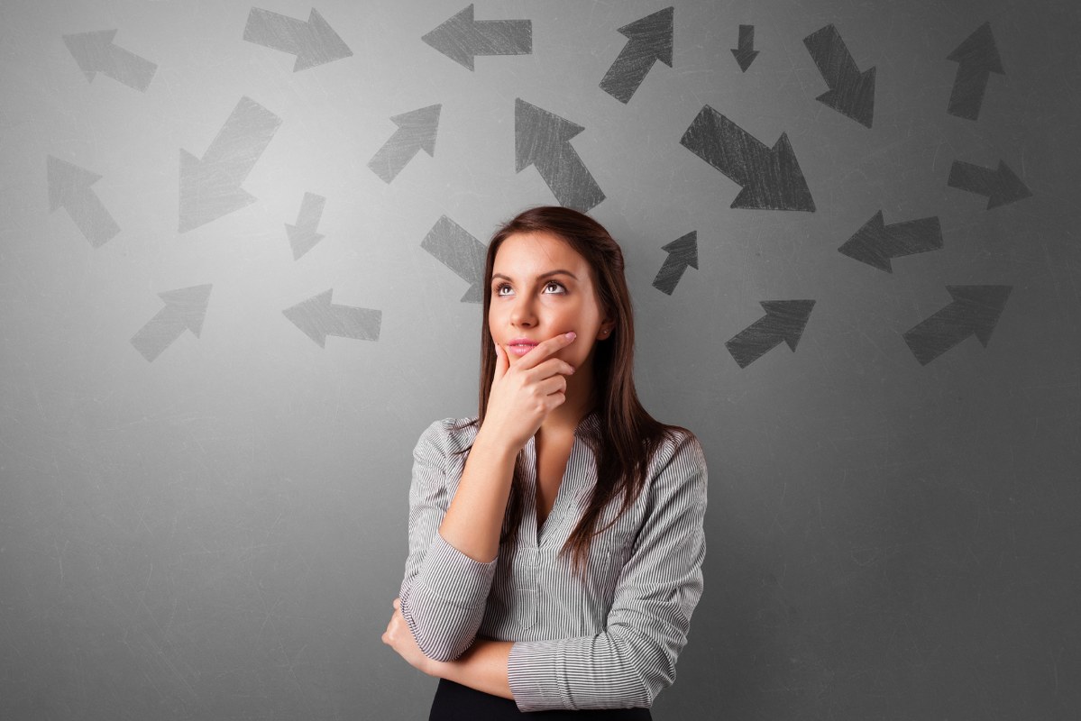 Business person choosing which direction.
