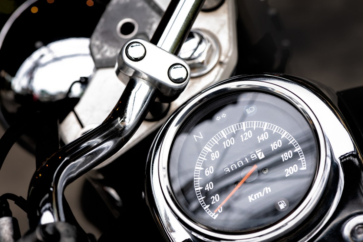 Classic motorcycle mileage dashboard of motorcycle.