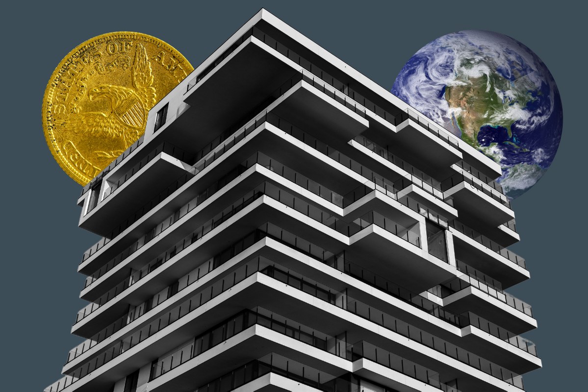 Corporate building with huge golden US coin and globe at the back.