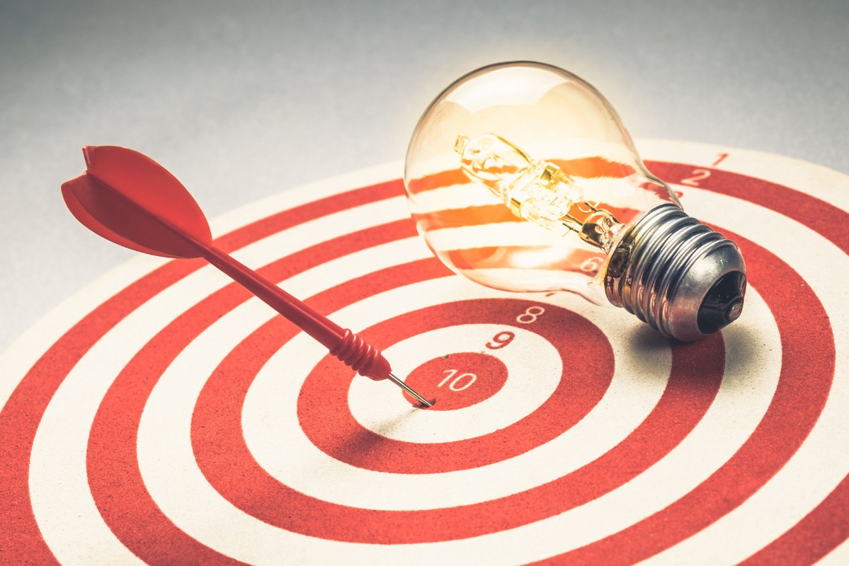 Dart hit bull's eye with light bulb.