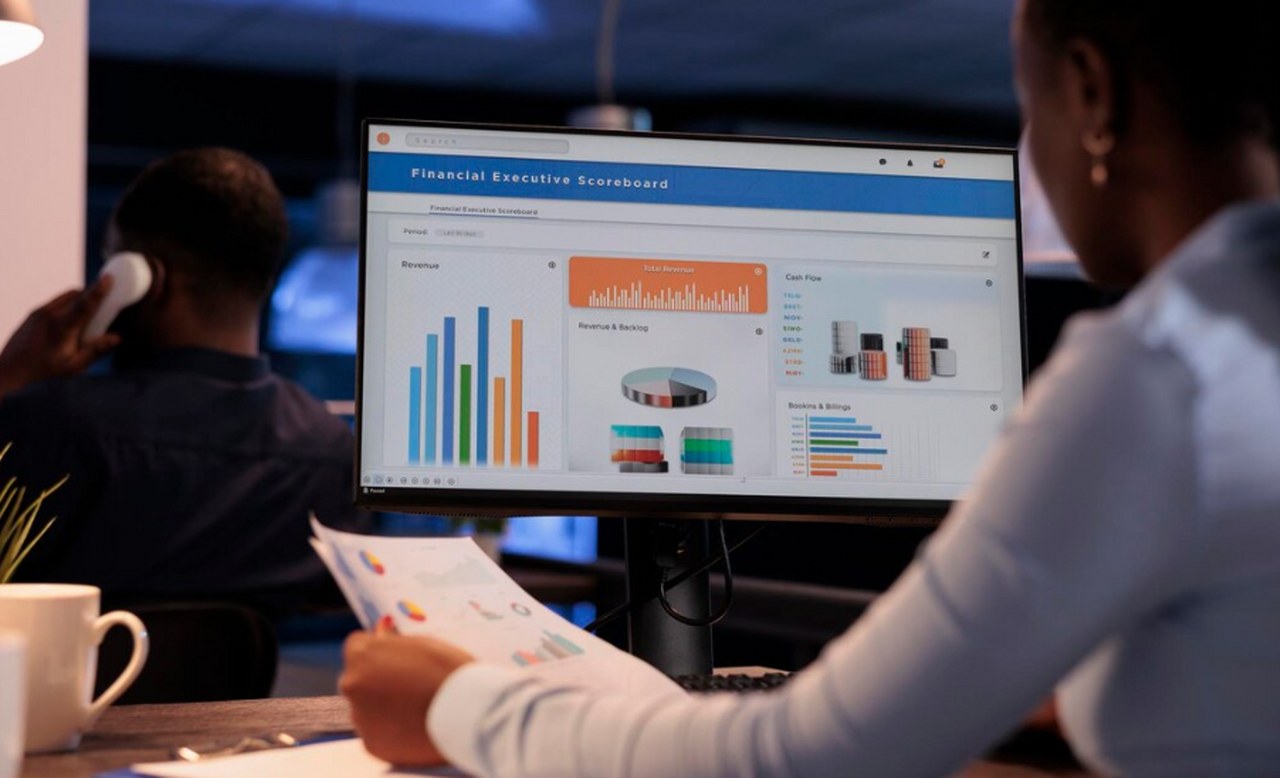 Data trends and reports displayed on a monitor.