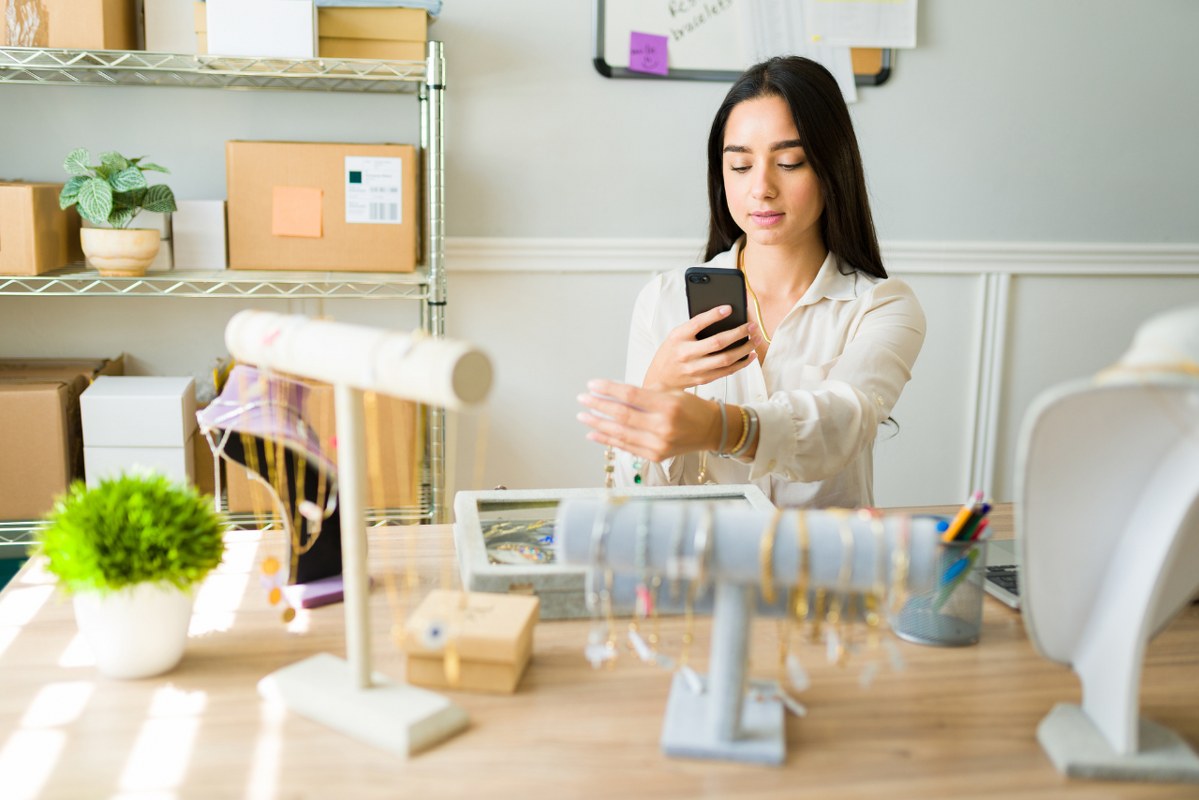 Entrepreneur working from home selling jewelry online.